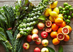 a group of fruits and vegetables on a wood surface Healthy Weight Loss Diets Shepperton Green